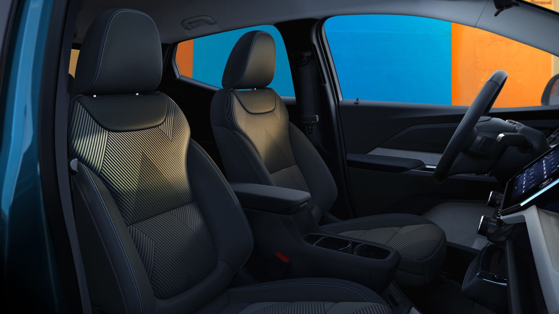 Interior view of a modern car dashboard featuring a multi-function steering wheel, digital display, and touchscreen with various apps. The trim includes red accents on air vents. Urban street scene visible through the windscreen.