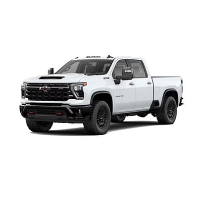 Silver SUV with a sleek design, featuring black accents on the grille and wheels. The vehicle has a slightly raised stance, with tinted windows and a prominent front bumper grill.